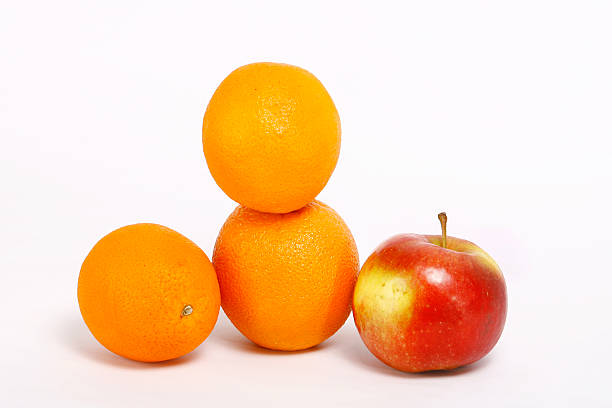 istock Fresh orange and apple isolated on white background 178543130