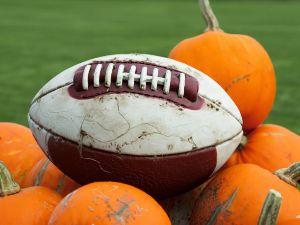istock Old American Football with Pumpkins 1785448154