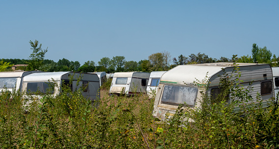 Panorama Abandoned campsite with old caravans