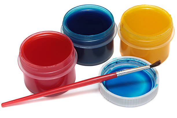 istock Children's paints in jars and brush 178545521