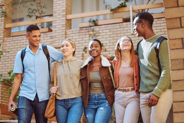 istock Men, bonding women or walking on university, school or college campus for education, learning or studying class. Smile, happy friends or students diversity group on morning commute routine to academy 1785466128