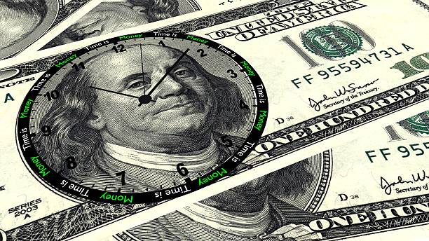 Time is Money 100 Dollar Clock stock photo