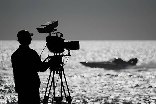 istock Cameraman with camera at a swimming event 178547228