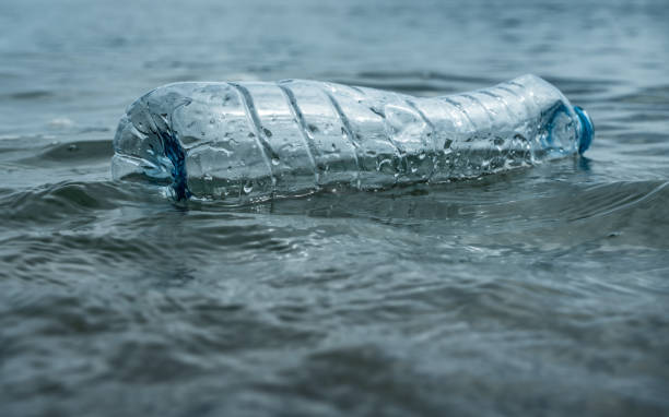 istock Plastic water bottles pollution in ocean. Environment concept. 1785476610