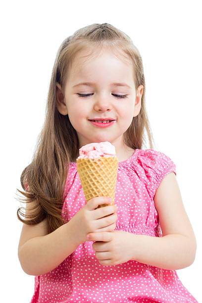 istock child girl eating ice cream in studio 178548097