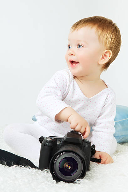 istock Beautiful Baby With Camera 178548373
