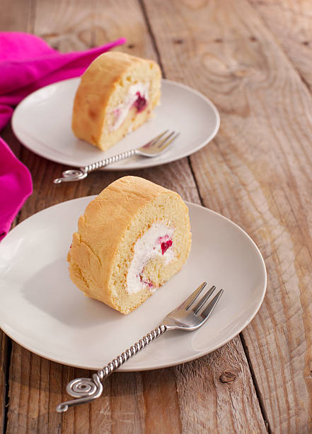 istock Homemade swiss roll with whipped cream and black currant jam 178548377