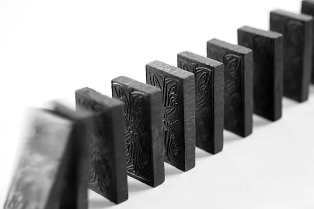 A row of dominoes falling