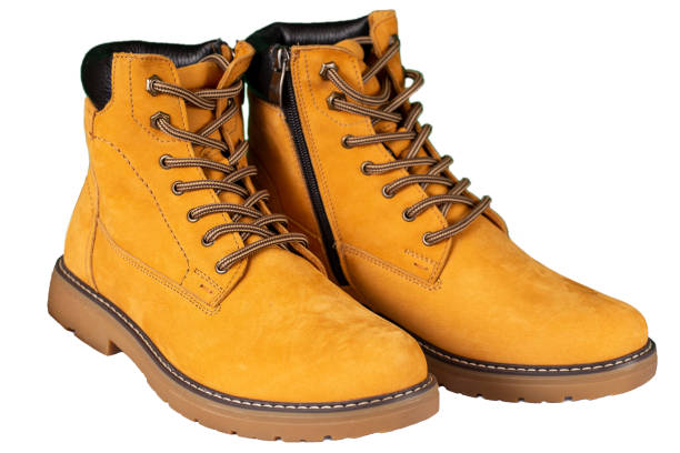 istock Winter brown nubuck boots with laces and zipper on a white background 1785488134