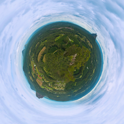 Mini planet like panorama photo of Glasshouse Mountains Sunshine Coast Australia. Image taken from top of Mount Ngungun and shows surrounding area with Mt Tibrogargan, Mt Beerburrum, Mt Beerwah on hoirizon.