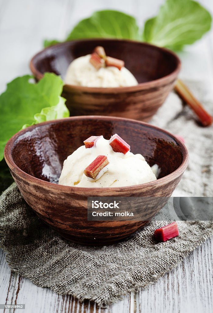 Homemade ice cream Homemade ice cream with rhubarb and vanilla Bowl Stock Photo