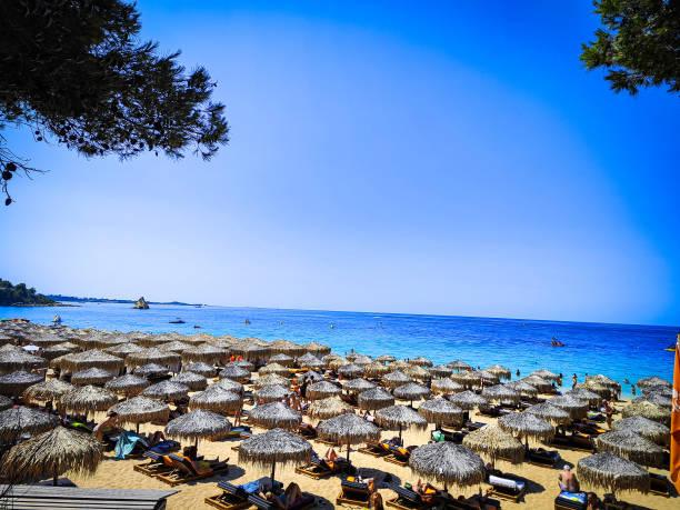 istock Beautiful beach with umbrellas and sun loungers 1785490449