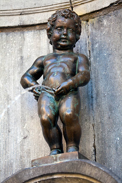 The famous Manneken Pis in Brussels The famous Manneken Pis in Brussels, Belgium. manneken pis statue in brussels belgium stock pictures, royalty-free photos & images