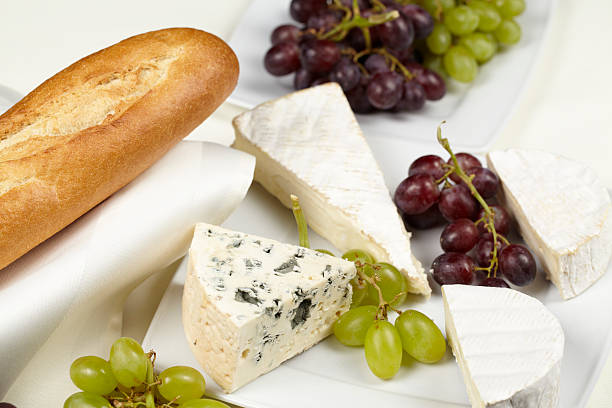 istock French table with baguette, grapes and cheese 178549214