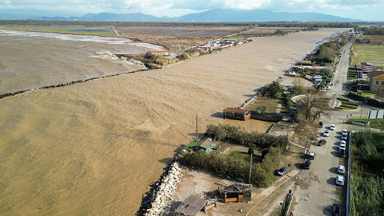 Storm in Marina di Pisa, Tuscany. Fury of the waves on the coast, aerial view on a sunny morning