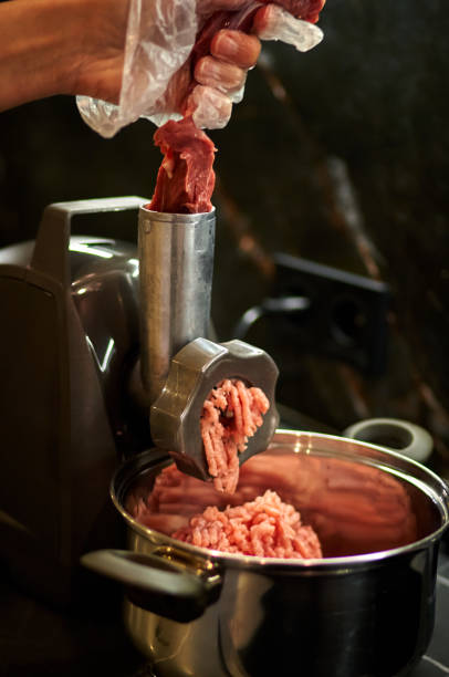 istock meat is minced in a meat grinder 1785503154
