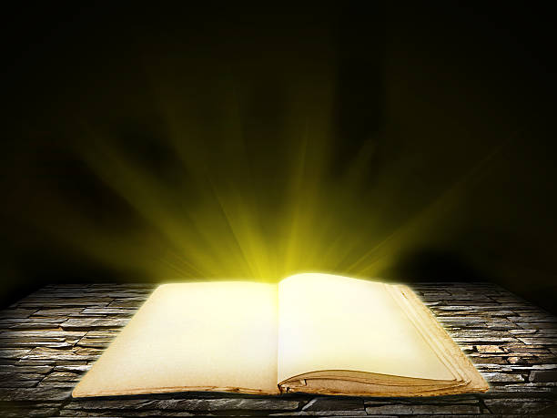 istock Old open book with blank pages on stone grunge background 178550569