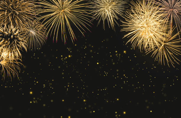 istock Golden fireworks on black background with sparks. New year celebration concept 1785512548