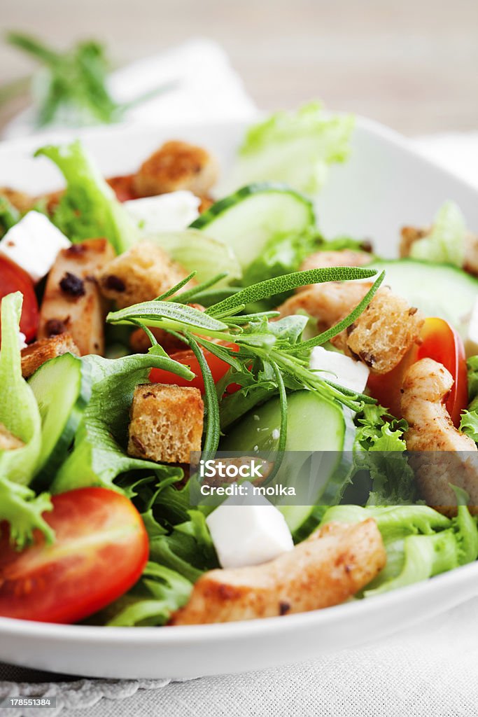 Chicken salad Salad with roasted chicken, tomatoes and feta Appetizer Stock Photo