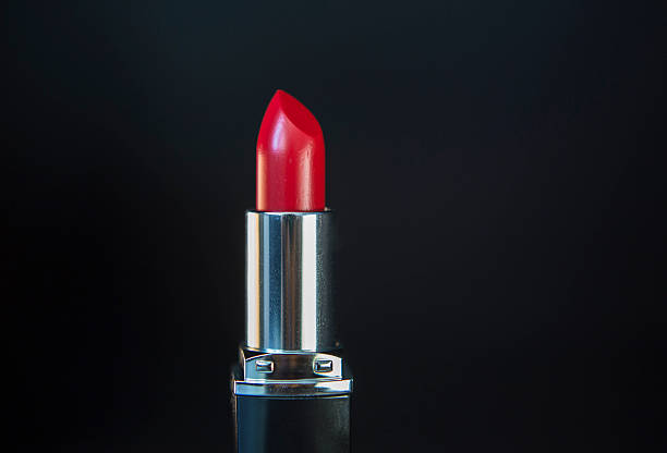 istock Red lipstick close up with black background 178551451