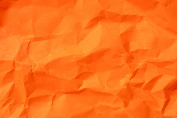 istock Orange crumpled paper texture used for paper background texture in decorative art work 1785514557