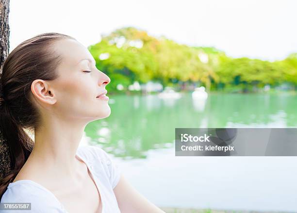 Woman Relaxing Outdoors Stock Photo - Download Image Now - 20-29 Years, Adult, Adults Only