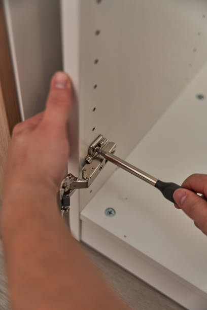 istock Handyman is making cabinets at home 1785524438