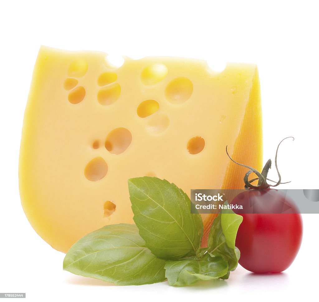 Cheese and basil leaves still life Cheese and basil leaves still life   on white background Basil Stock Photo