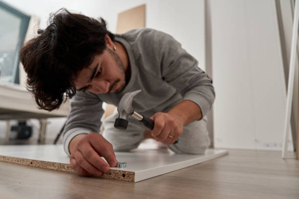 istock Handyman is making cabinets at home 1785524443