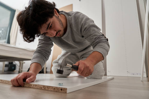 istock Handyman is making cabinets at home 1785524470