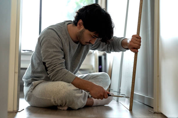 istock Handyman is making cabinets at home 1785524996