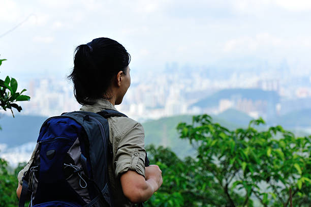 istock woman hiker stand mountain peak 178553017