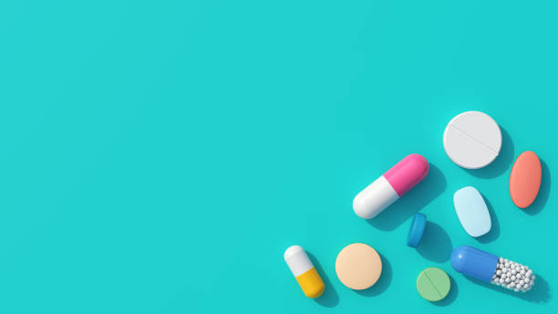 istock Scattered Pills on Blue Background, top view. Space for copy. 1785530951