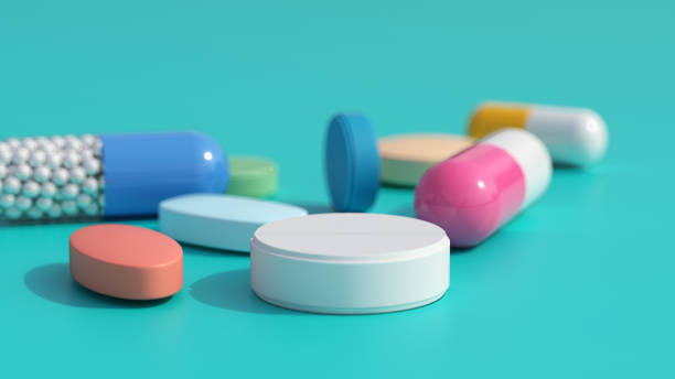 istock Scattered Pills on Blue Background, top view. 1785530958