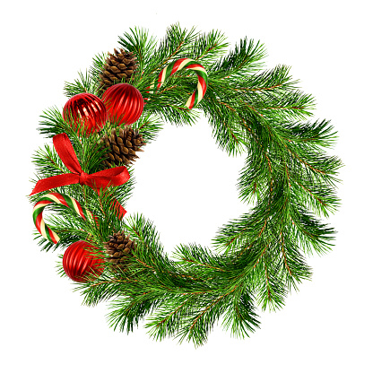 Christmas wreath from pine twigs with red silk ribbon bow, sweet stick, pines and decorative balls isolated on white background