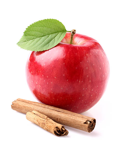 Apple with cinnamon stock photo