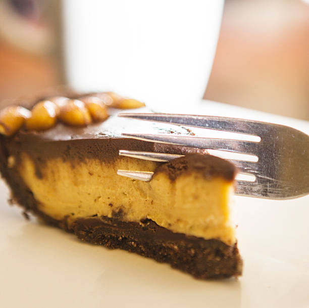 istock Slice of peanut butter chocolate pie and a fork 178553462