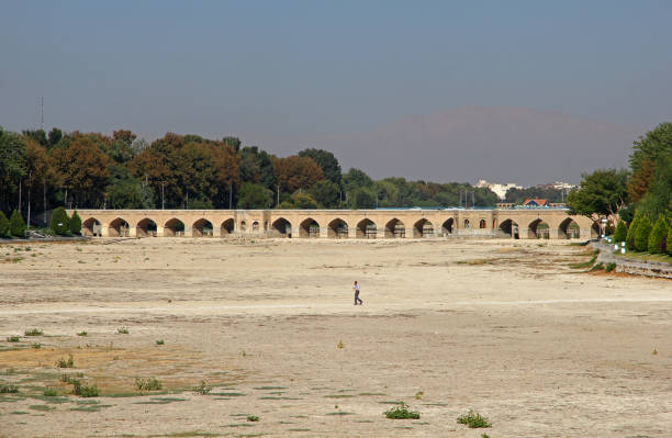 Arched vaults of brick under an ancient stone Allahverdi Khan bridge, Isfahan, Iran.