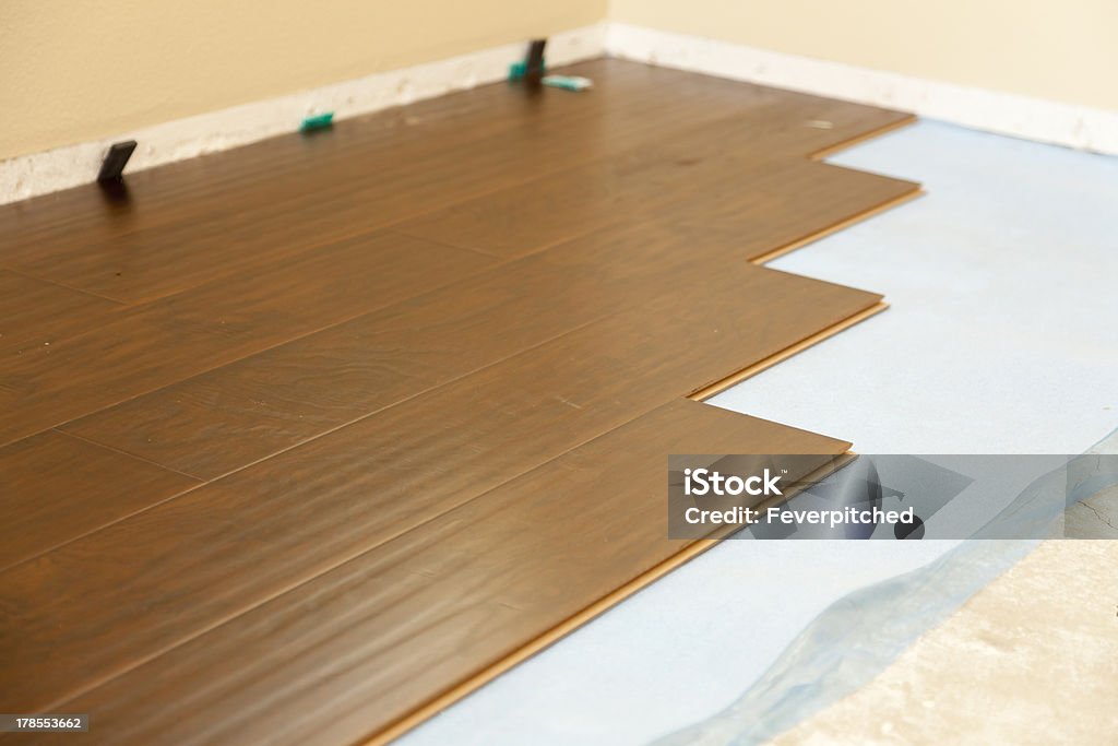 Newly Installed Brown Laminate Flooring Newly Installed Brown Laminate Flooring Abstract. Abstract Stock Photo