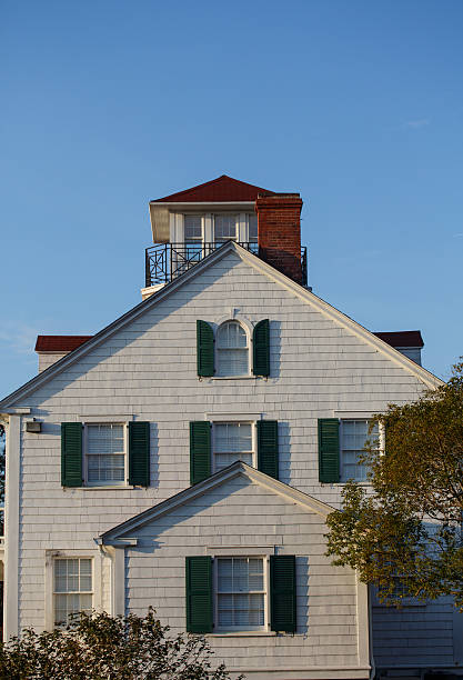 istock Wood Siding Coastal Home with Green Shutters 178553860