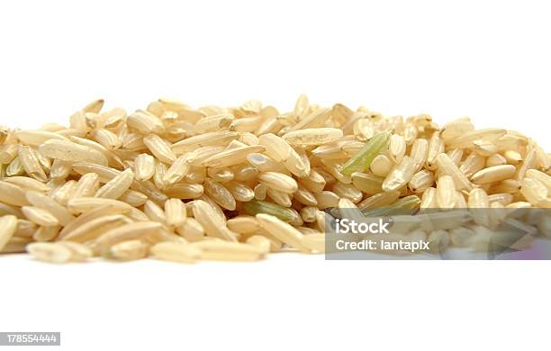 Arroz Integral - Fotografias de stock e mais imagens de Arroz - Alimento Básico - Arroz - Alimento Básico, Branco, Castanho