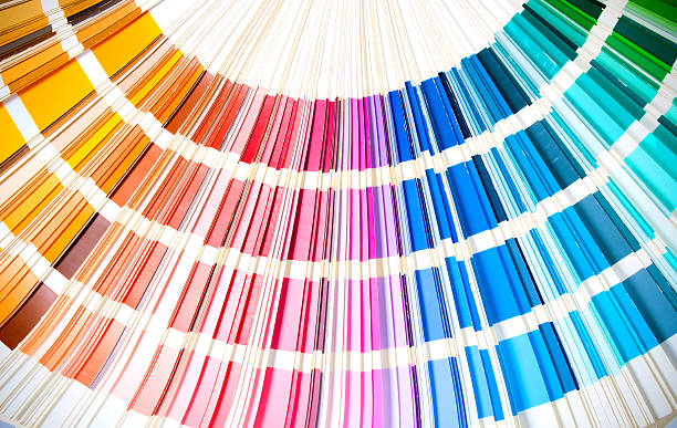 istock coloured swatches book open showing an array of rainbow colours 178554853