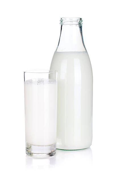 istock Opened bottle and glass with milk 178554978