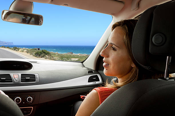 istock Woman enjoying new car with husband 178555382