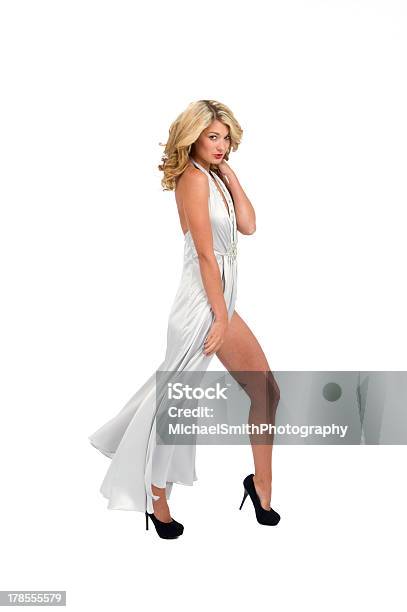 Woman In A Long Flowing Slit Gown With High Heels Stock Photo - Download Image Now - Activity, Adult, Adults Only