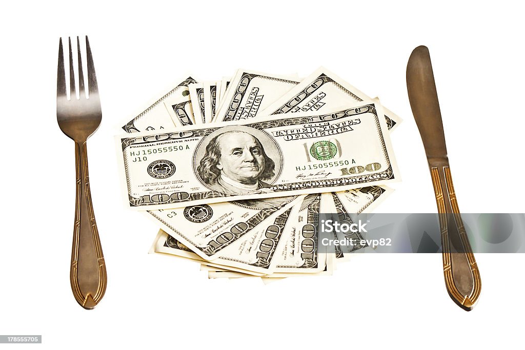 Dinero en la placa con un Tenedor y cuchillo - Foto de stock de Alimento libre de derechos