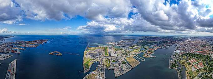 Aerial view of the HOFOR - Amagerværket in Copenhagen water management and electric plant with windmills at sea