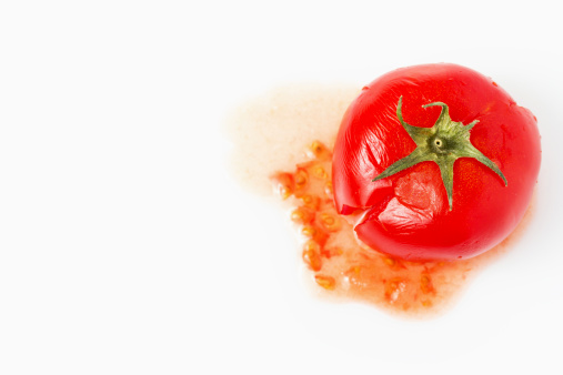 Single crushed tomato, close up
