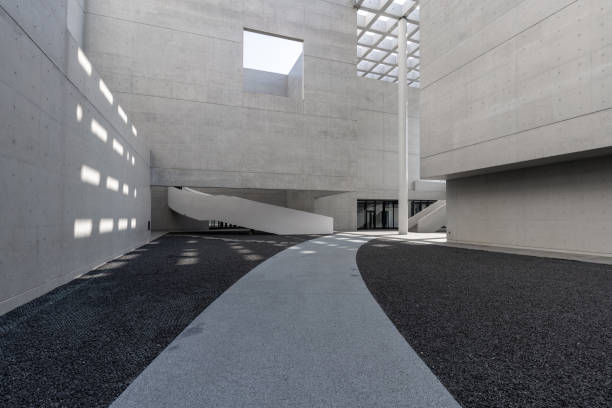 istock The cement walls and empty road of modern minimalist architecture 1785565903