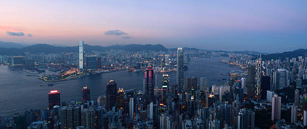 Hong Kong Skyline and Victoria Harbor at night Hong Kong Skyline and Victoria Harbor at night central plaza hong kong stock pictures, royalty-free photos & images